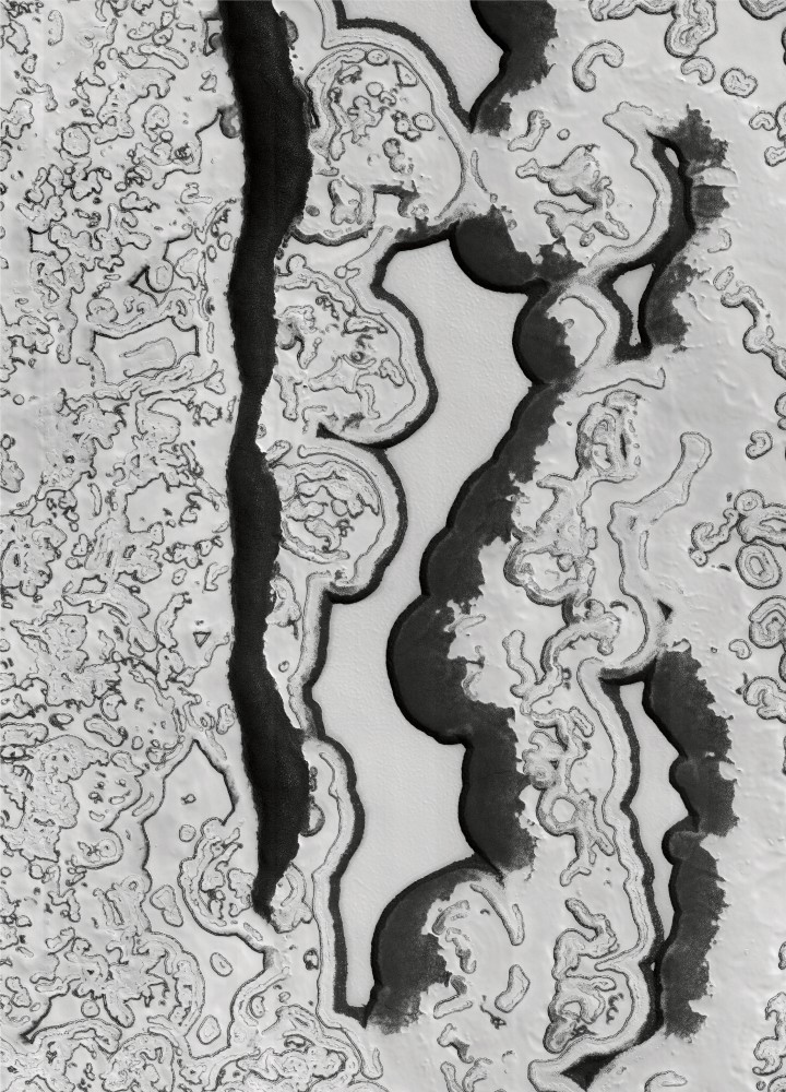 Région Polaire sud, zone de glace résiduelle. Extrait de Mars, une exploration photographique (François Rocard, Alfred Mc Ewen, Xavier Barral)